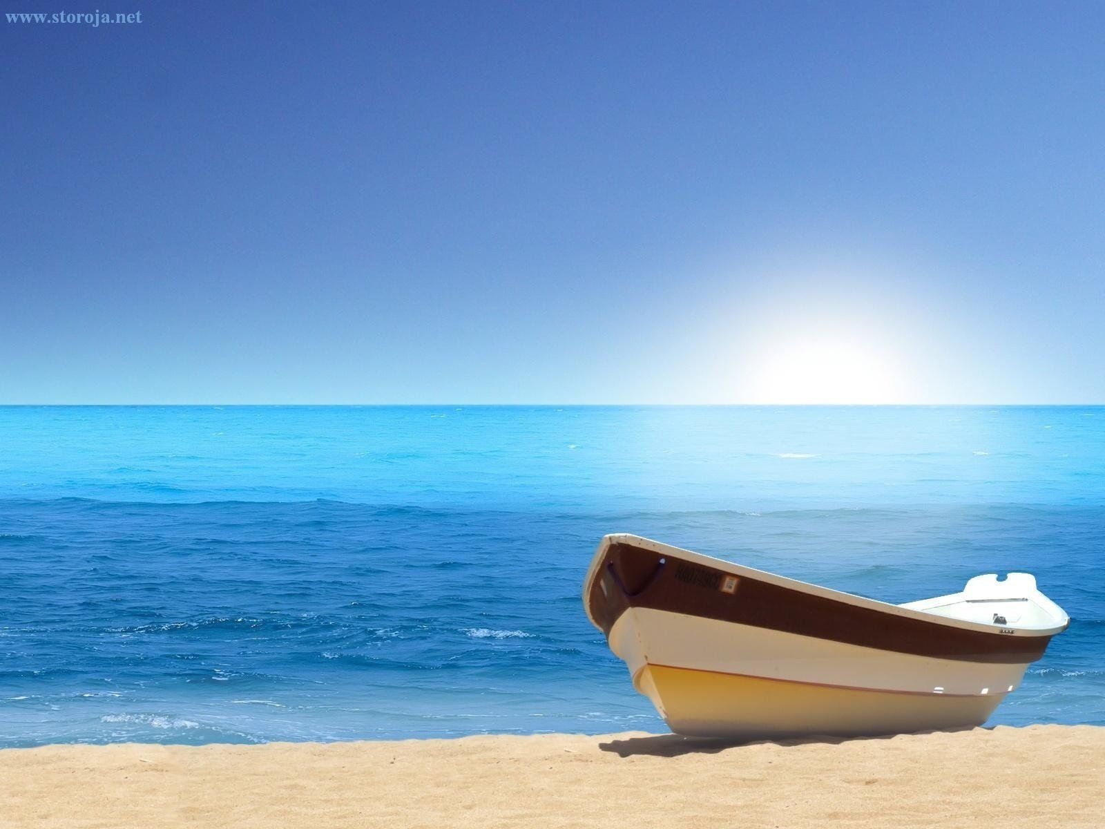 barca mare cielo sole