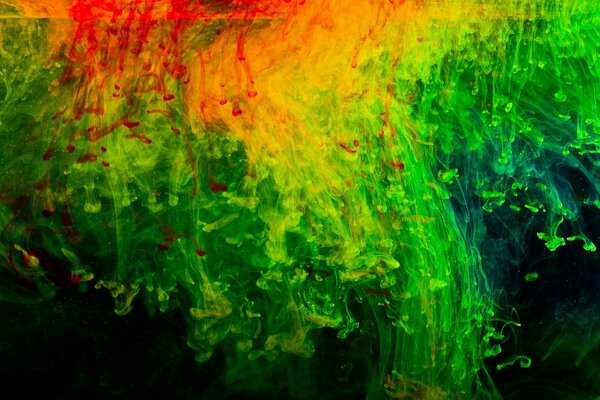 Texture insolita sotto forma di gocce di vernice rossa e verde