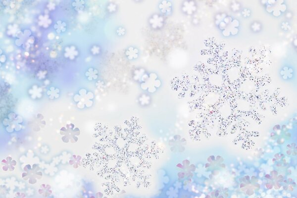 Fiocchi di neve lucidi su sfondo blu e bianco
